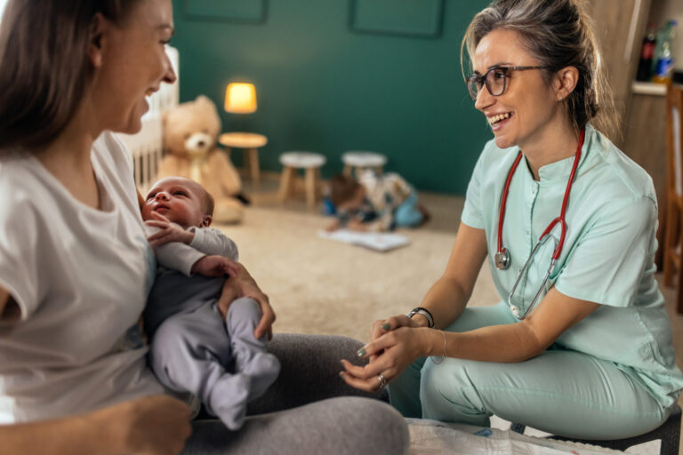 Pediatric nurse in Houston helping a mother and her child